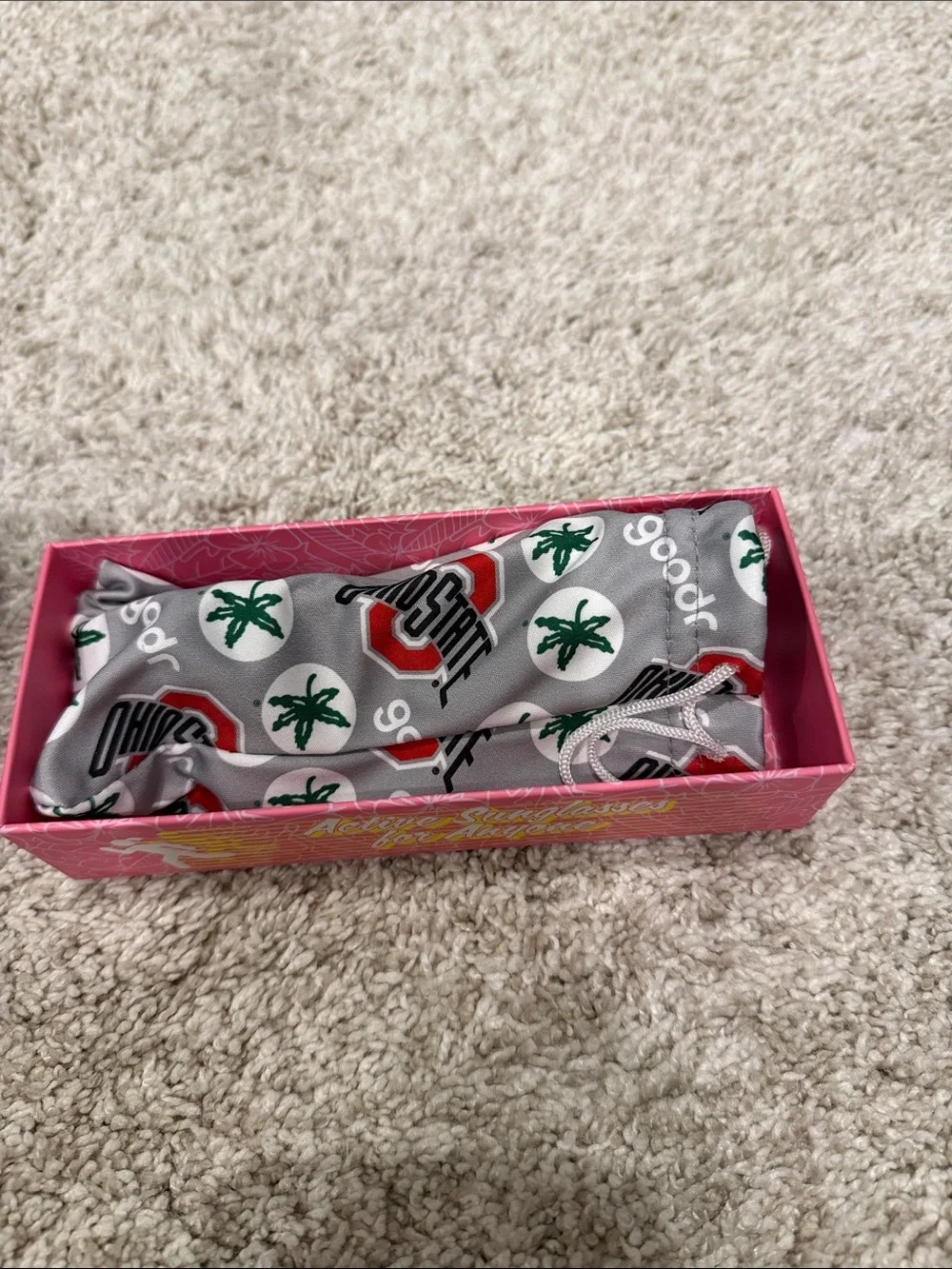 NWT Goodr sunglasses with Ohio State logo on side. Brand new never worn. Unisex